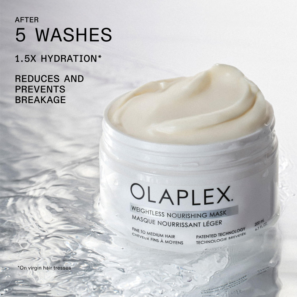 Olaplex open jar angle revealing product texture and dense cream