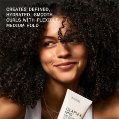 Olaplex N°.10 in hand for size comparison showing travel friendly benefit
