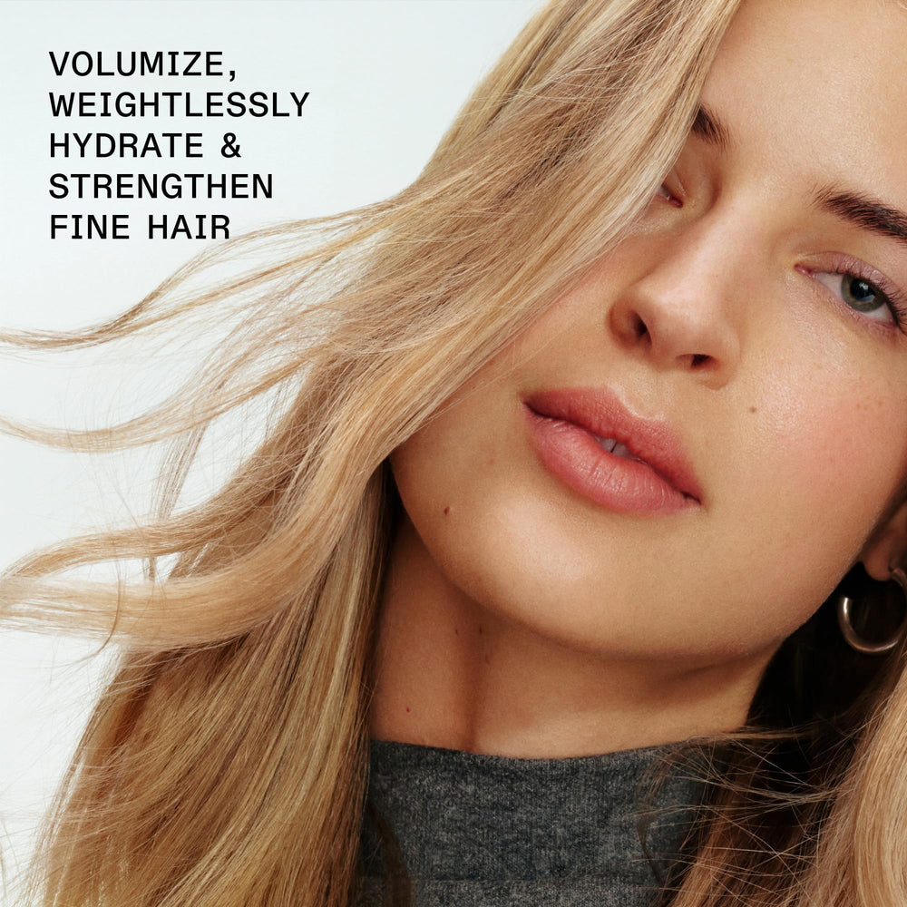 Foamy lather texture of Olaplex No.4FINE showing lightweight cleanse