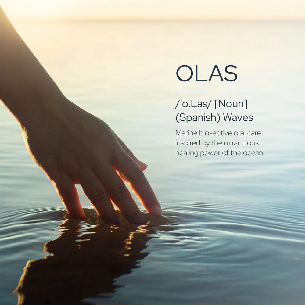 Person using Olas rinse demonstrating fresh breath benefit