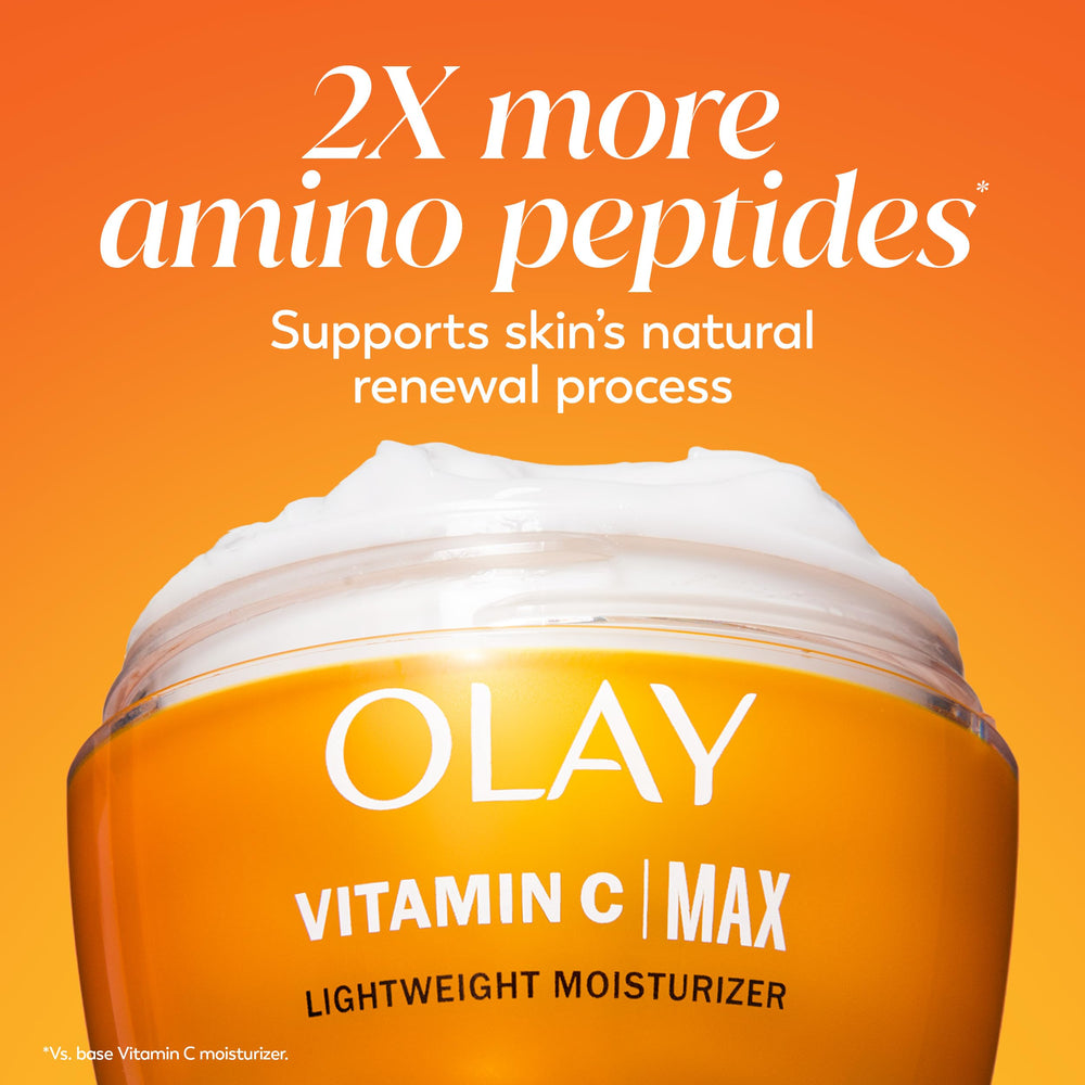 Olay cream on hand showing suggested pea-sized amount for even coverage and hydration