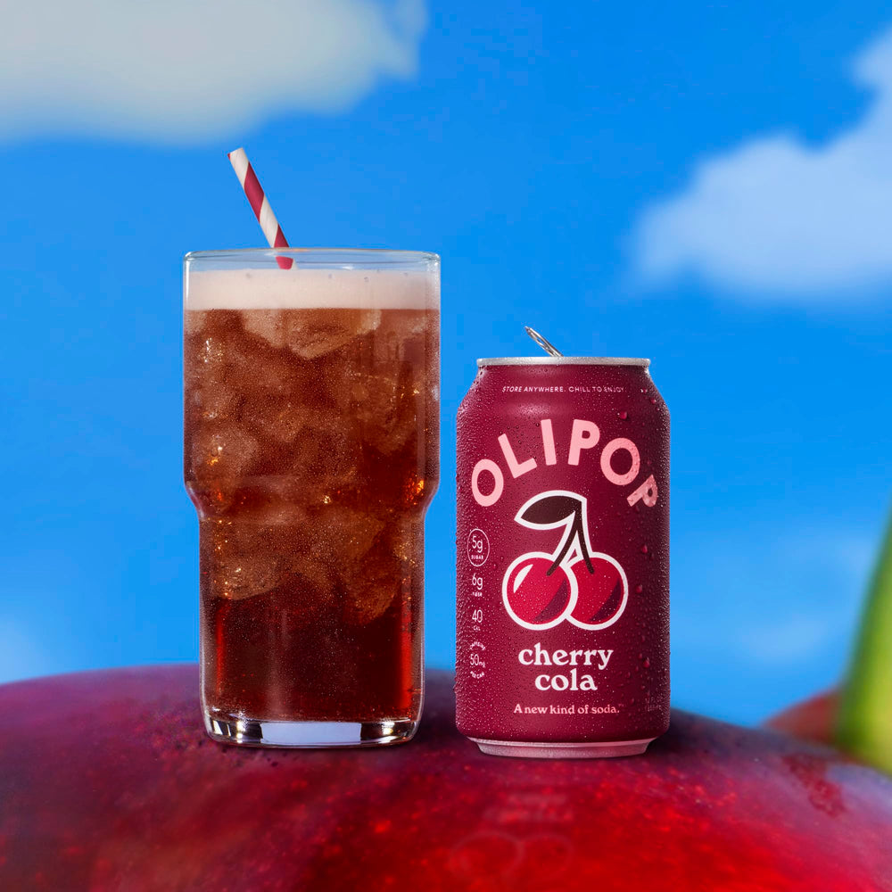 OLIPOP Cherry Cola 12-pack stocked in fridge for convenient chilled access