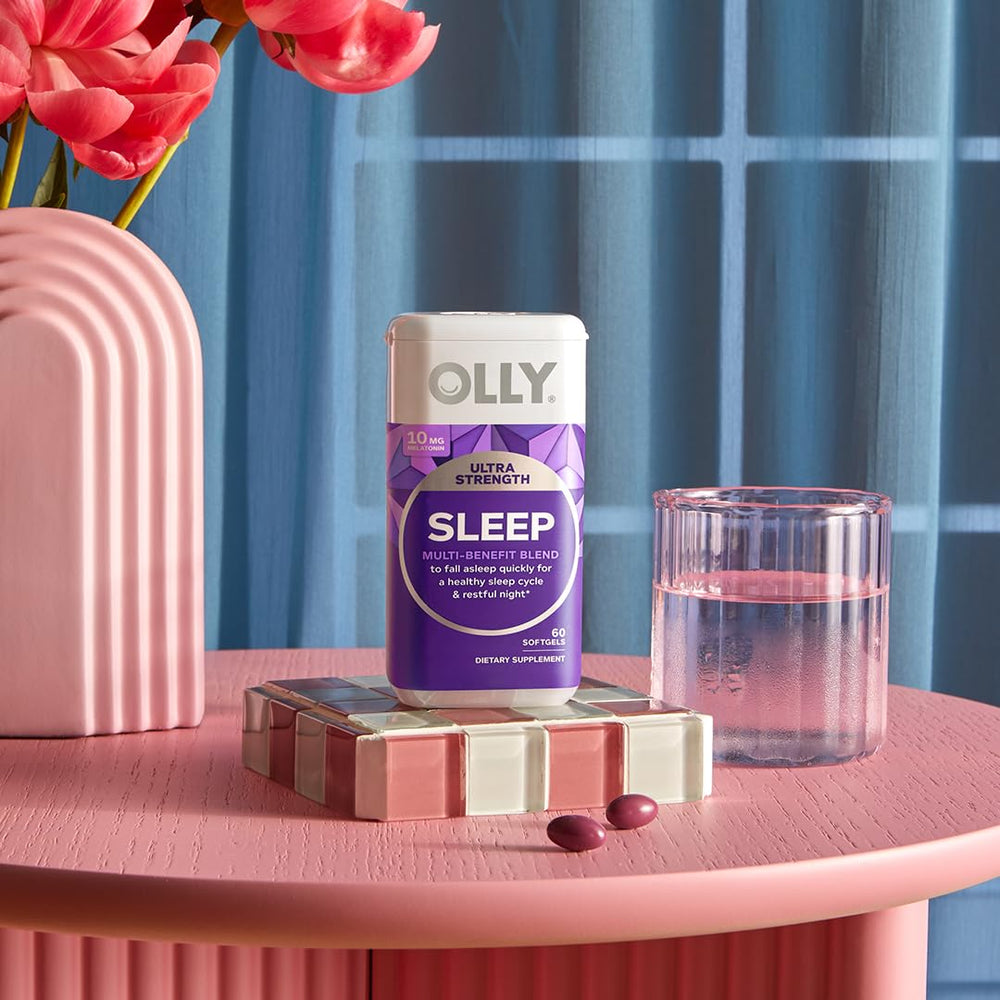 OLLY bottle in hand demonstrating travel-friendly month supply benefit