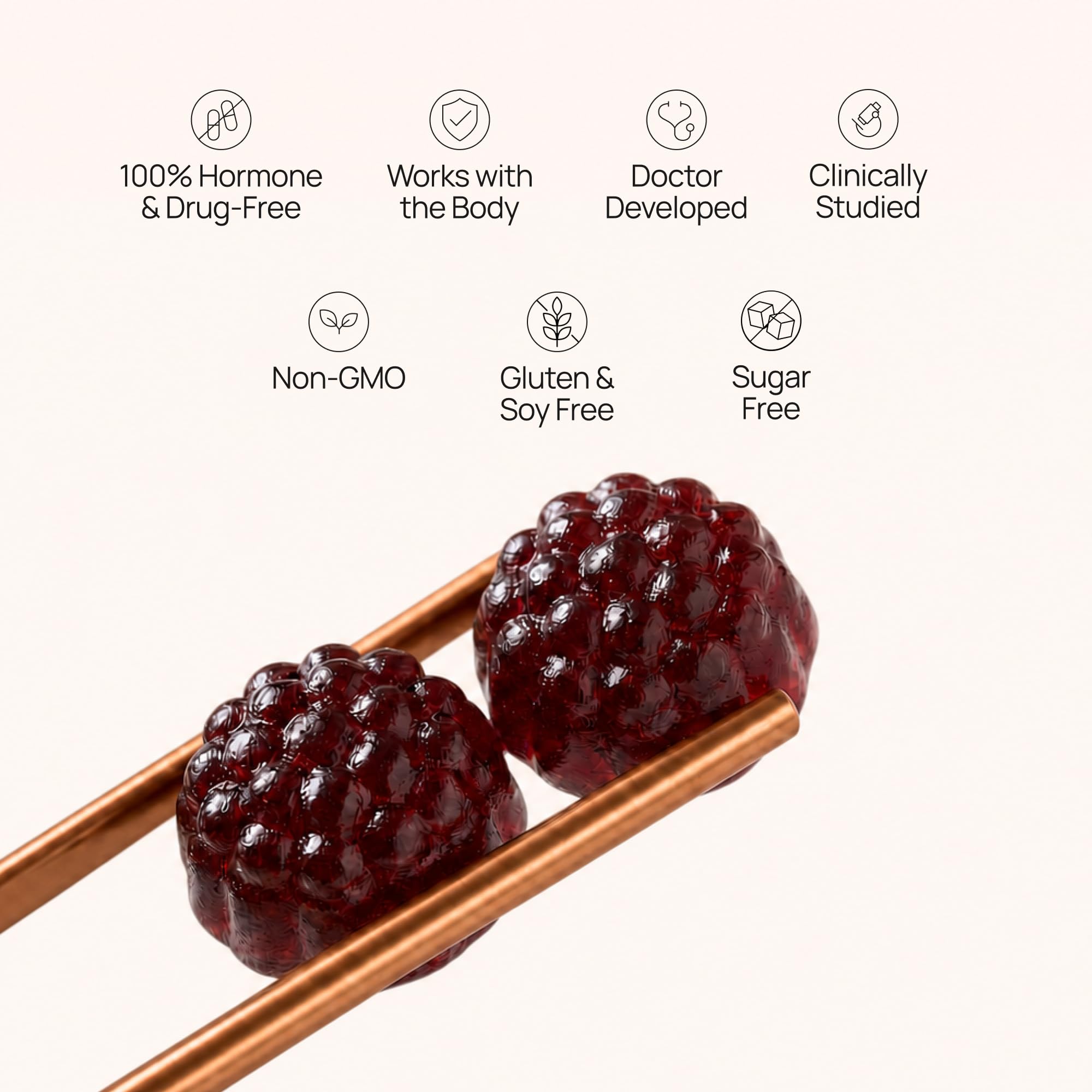 OMI WELLBEAUTY two gummies on spoon to illustrate recommended serving for consistent results