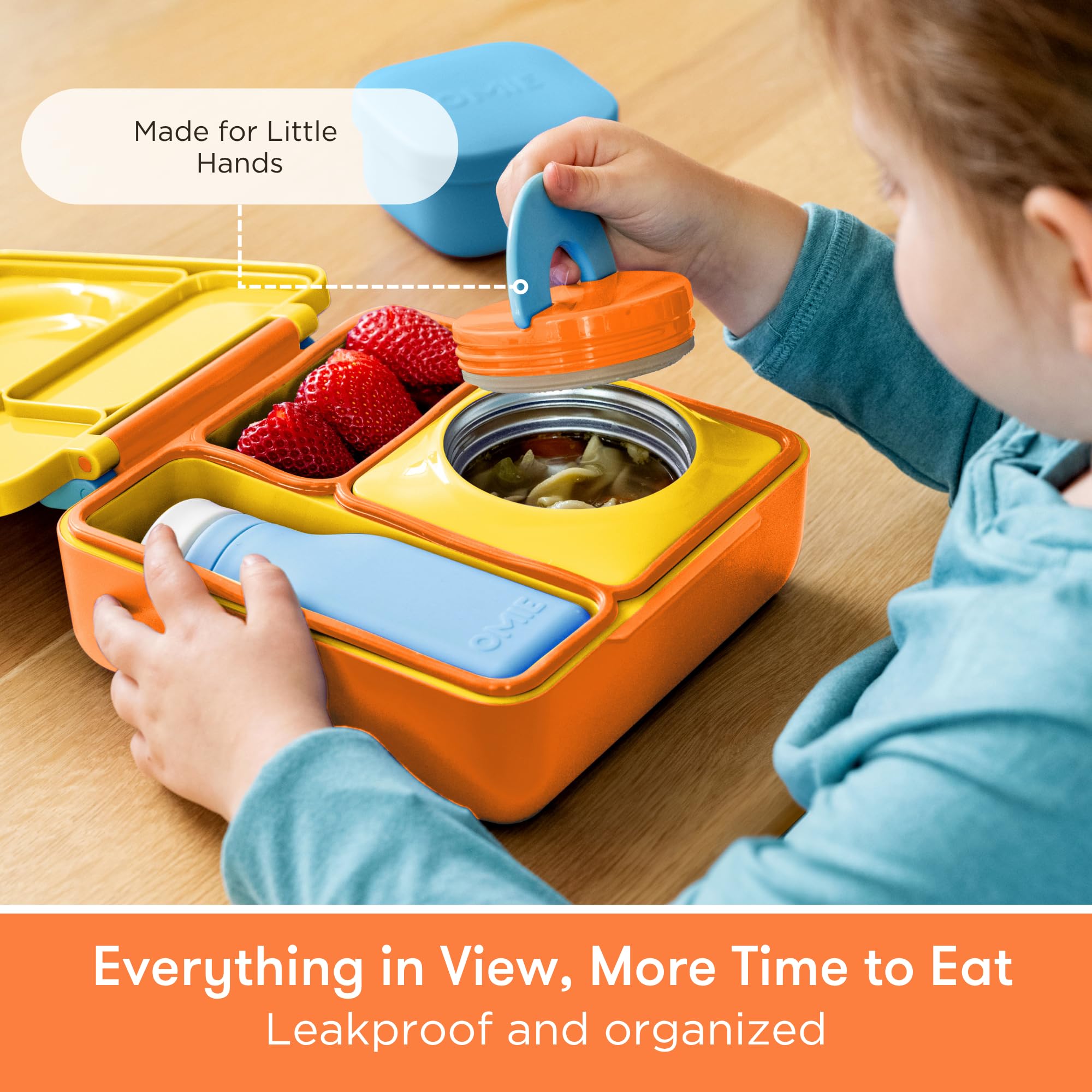 Omie packed lunch with warm entree and fresh fruit illustrating balanced meals benefit