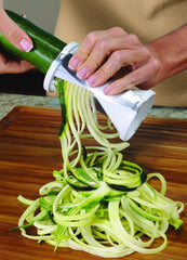 Ontel Veggetti in use with zucchini creating long noodle strands for healthier meals