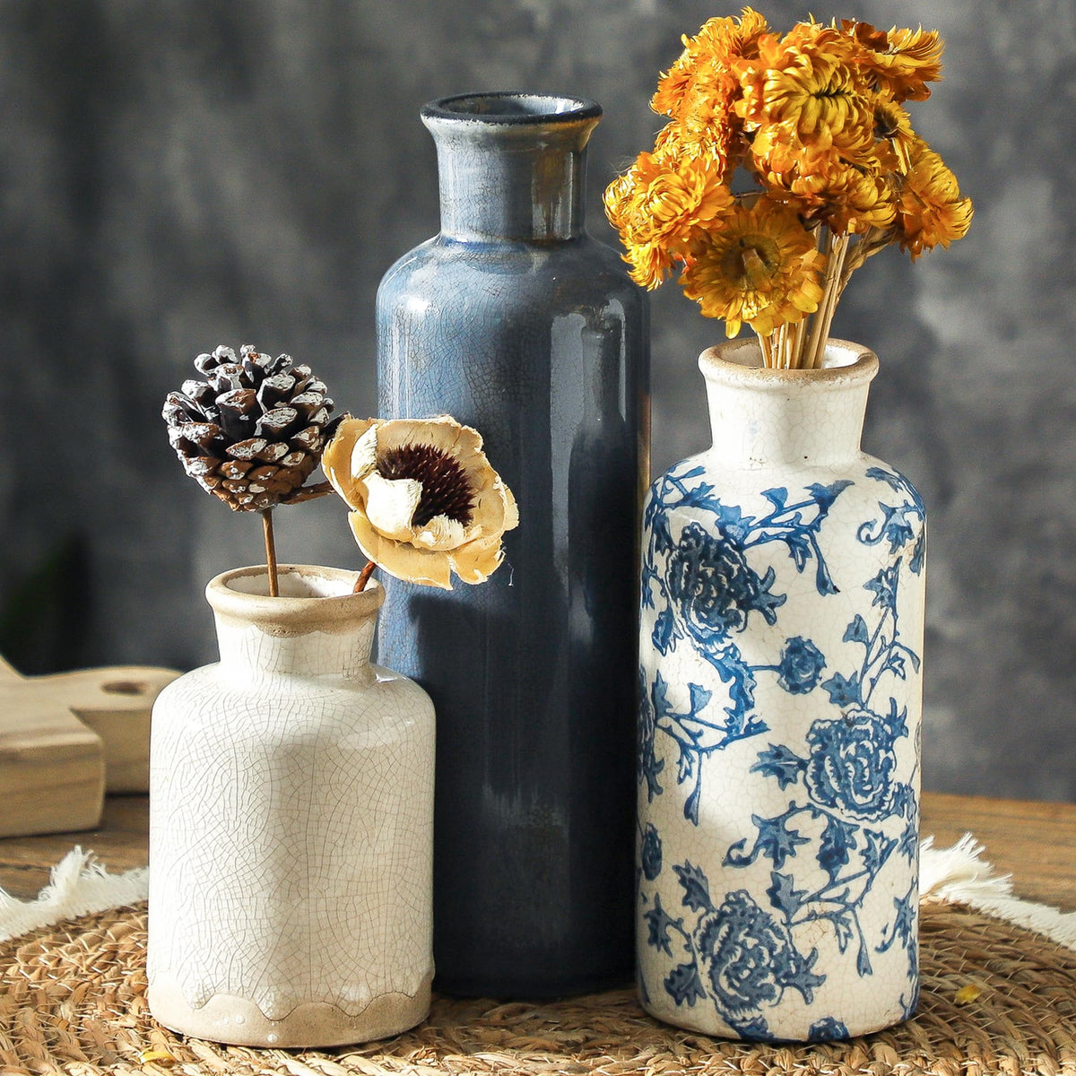 ooit front view of three-vase set showing coordinated shapes and vintage look