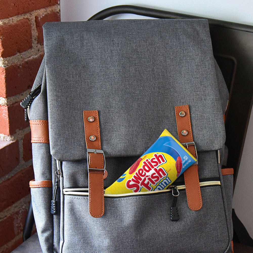 Open bag with gummies spread to show portion size and sharing-friendly packs