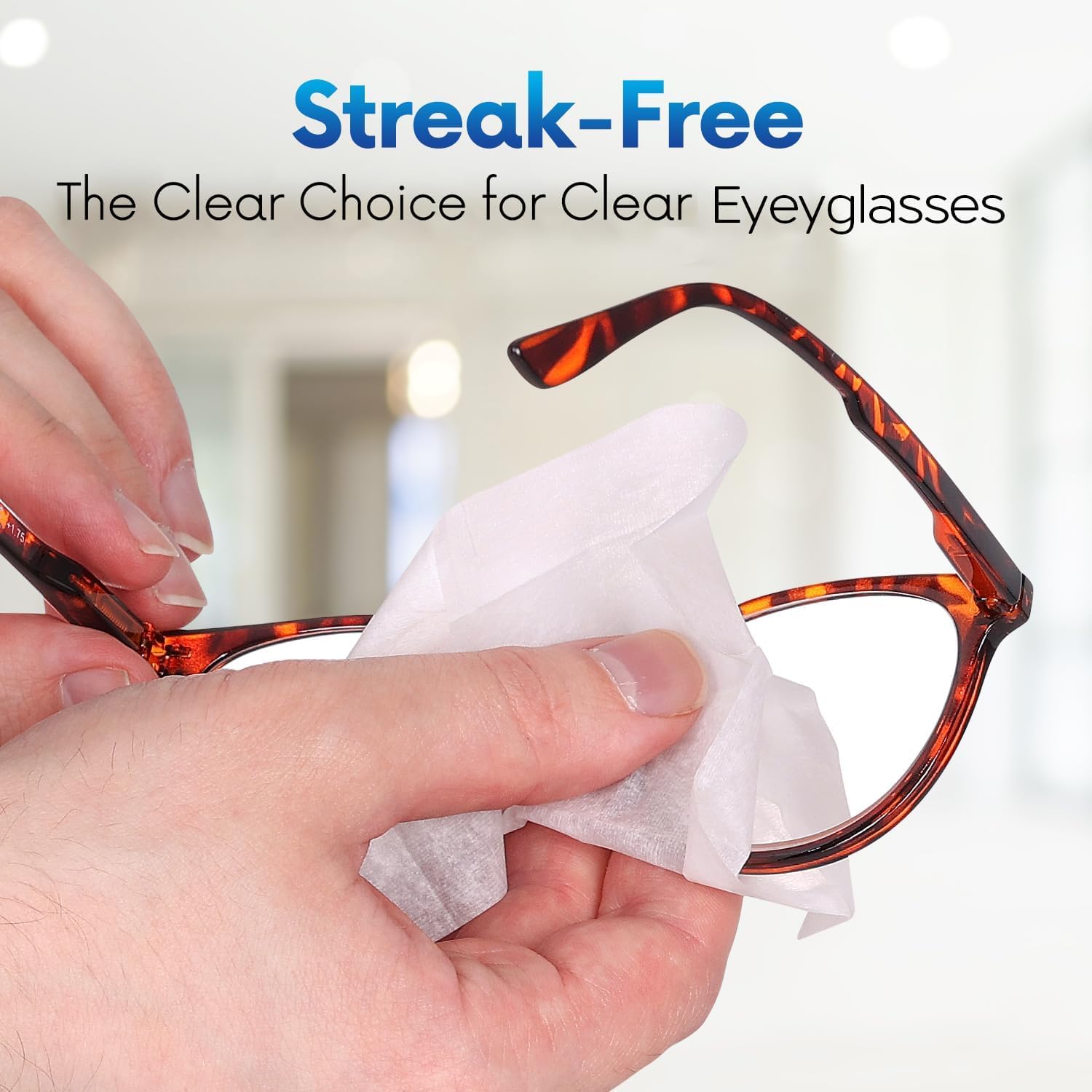 OPTEEL individual sealed packet open beside glasses for portable, sanitary cleaning benefit