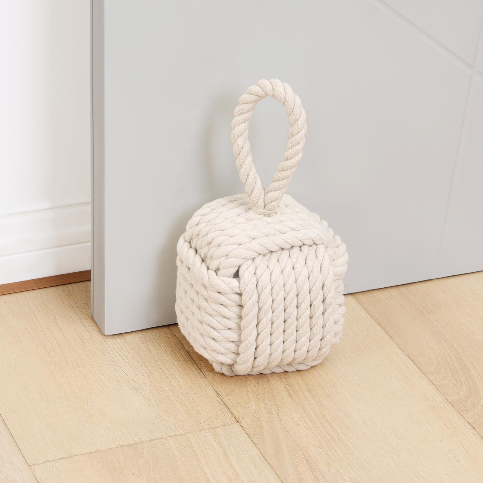 Optish beige rope doorstop front view showing knot and soft cotton finish for gentle floor protection