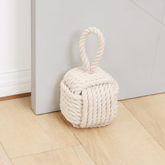 Optish beige rope doorstop front view showing knot and soft cotton finish for gentle floor protection