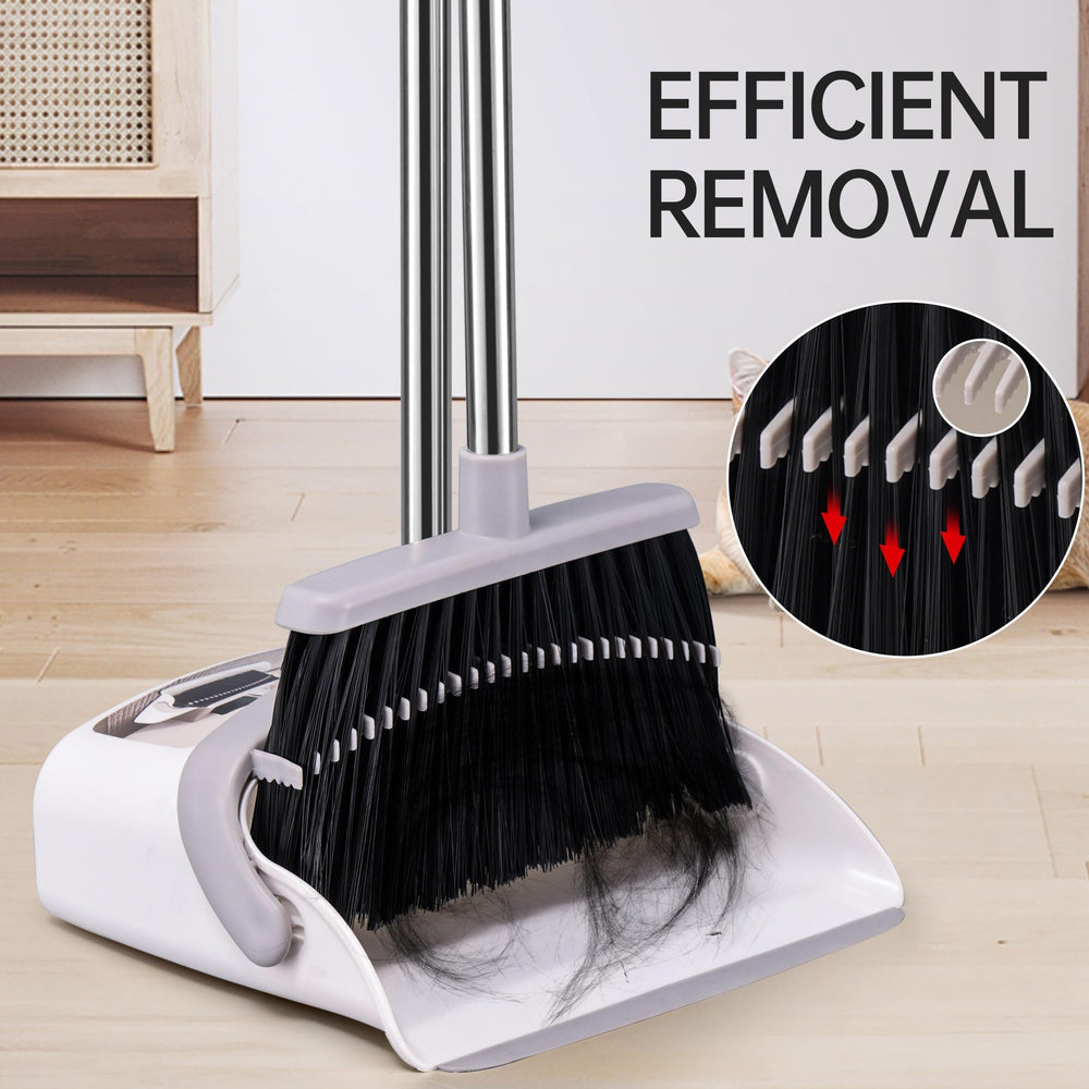 OPTTIDI broom next to a book to show portable size and easy handling
