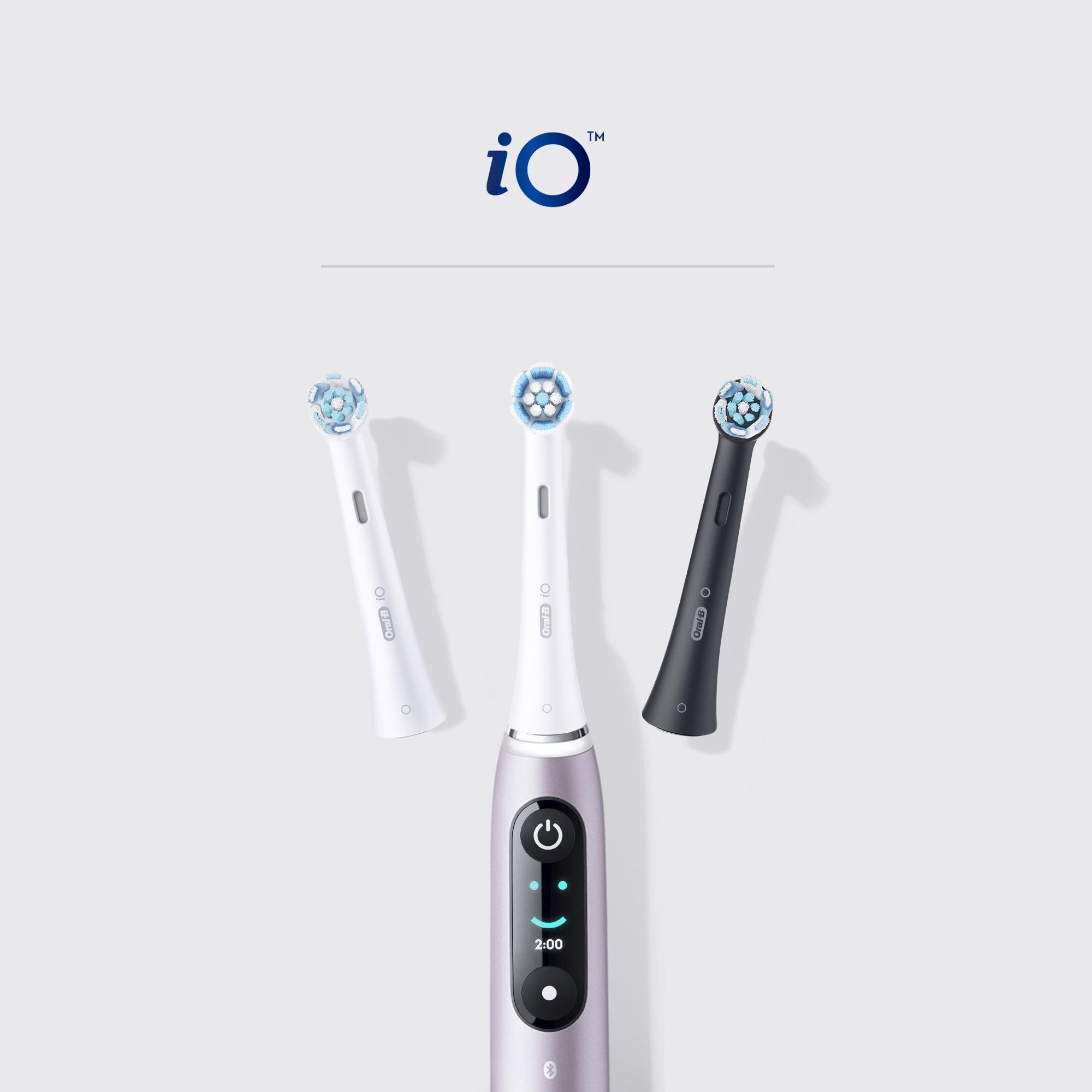 Four Oral-B Gentle Care heads fanned out to show included quantity and design