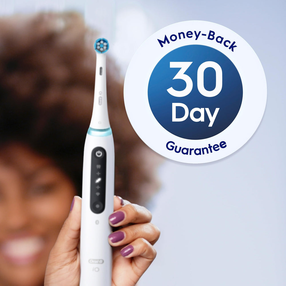 Oral-B brush head placed by sink showing daily use comfort and gentle cleaning benefit