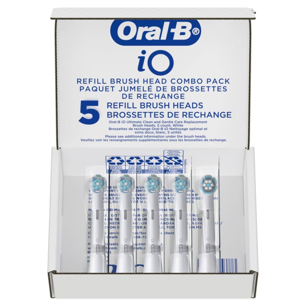Oral-B pack contents arranged showing included four Ultimate Clean and one Sensitive
