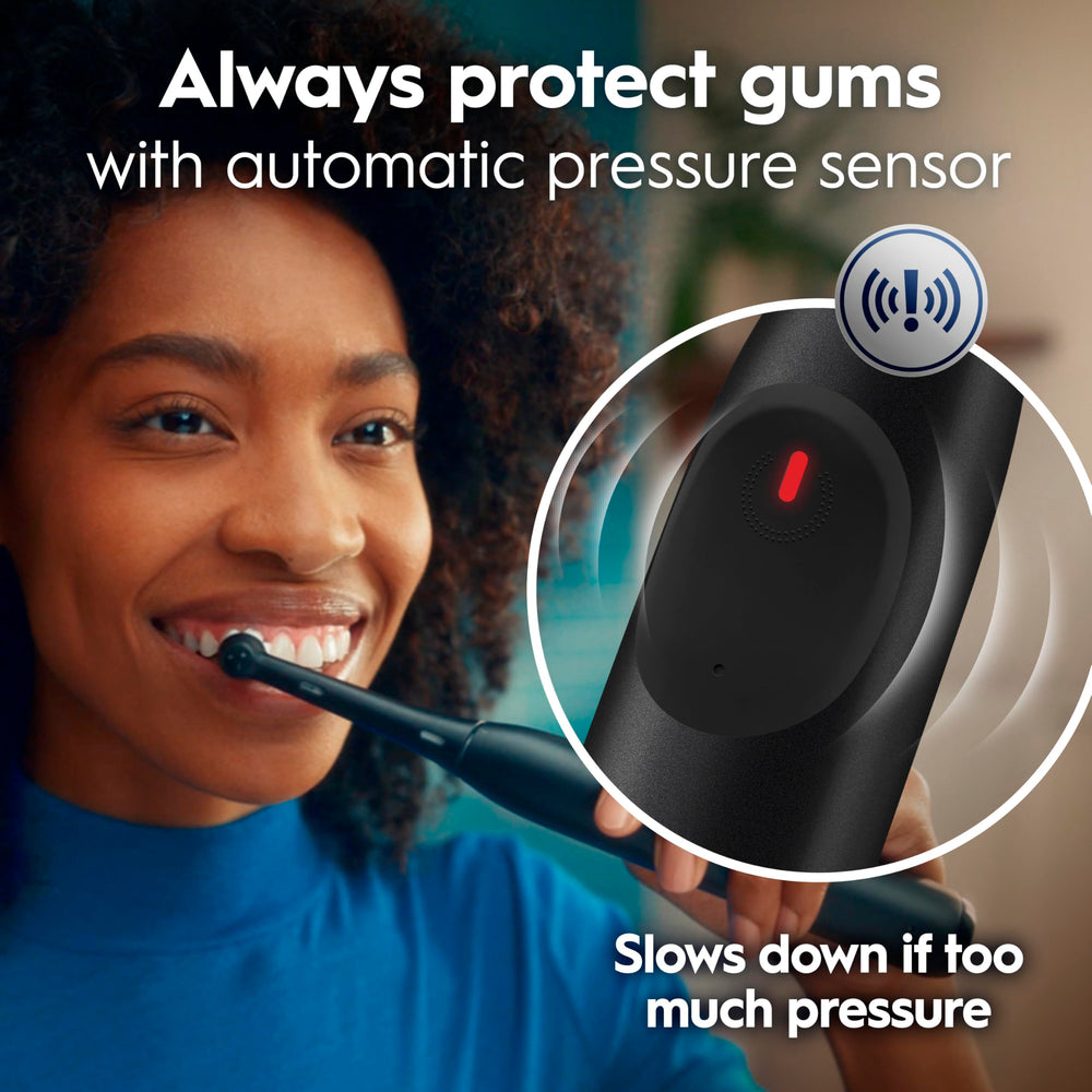 Oral-B handle pressure sensor glowing red to indicate too much force and protect gums