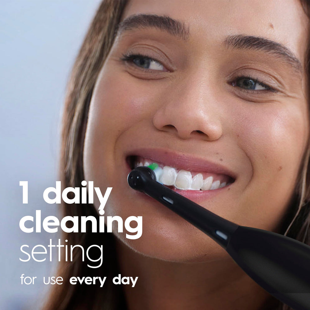 Oral-B toothbrush with two AA batteries included for reliable power
