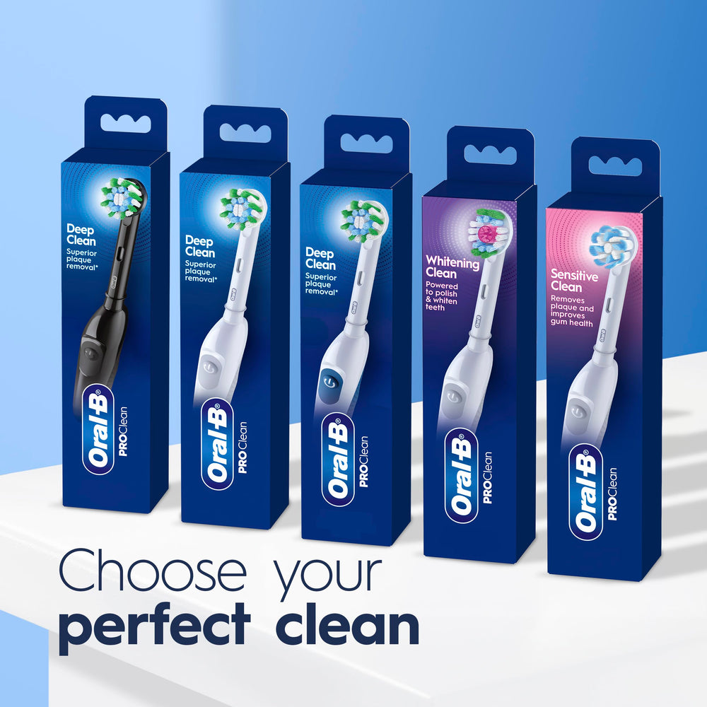 Oral-B Pro 100 next to toothpaste tube showing compact size for storage