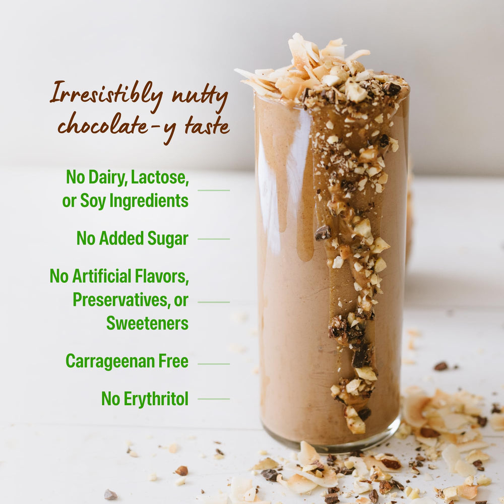 Protein powder stirred into overnight oats demonstrating recipe versatility