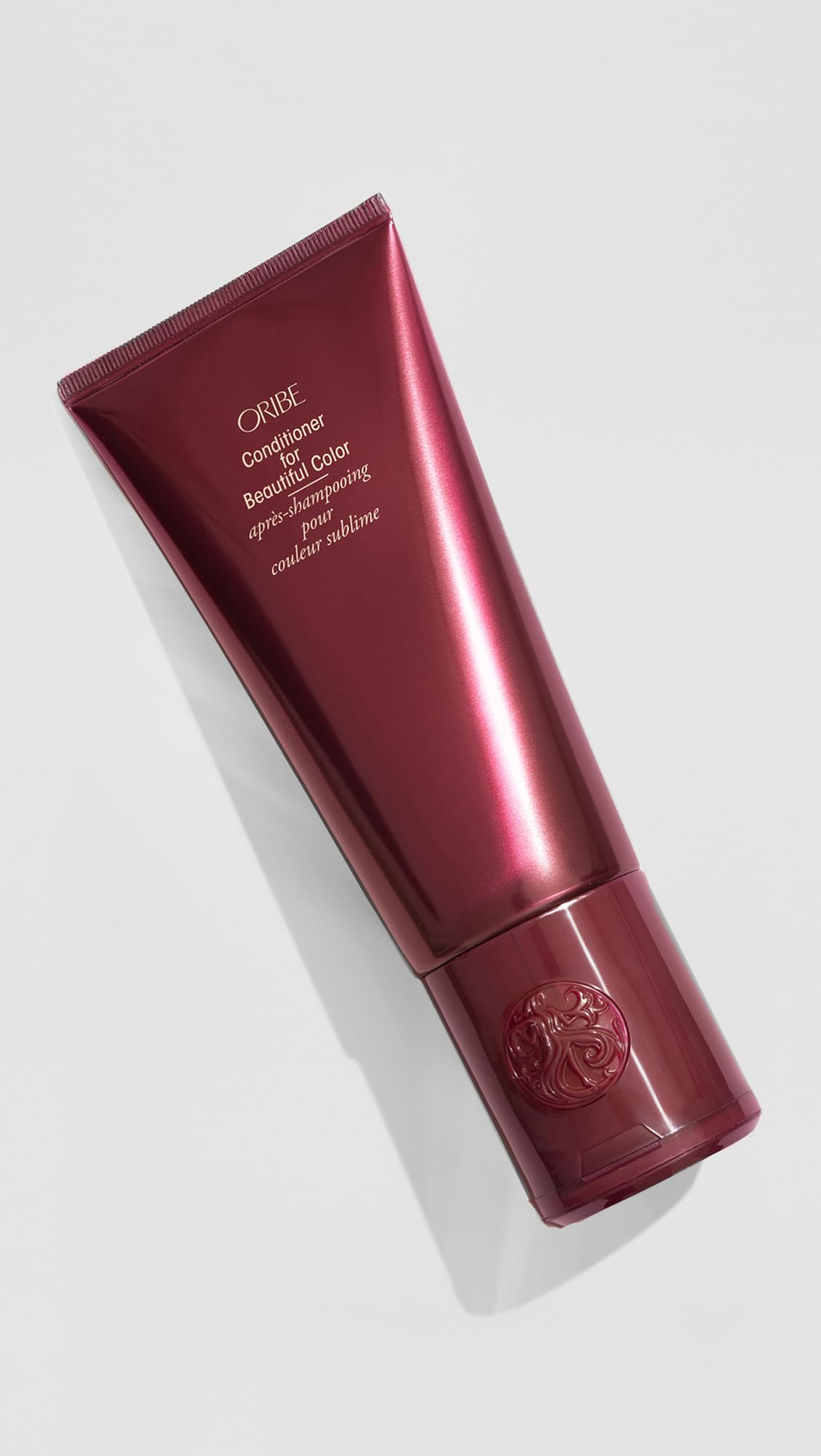 Oribe conditioner cream texture close-up highlighting rich moisturizing benefit