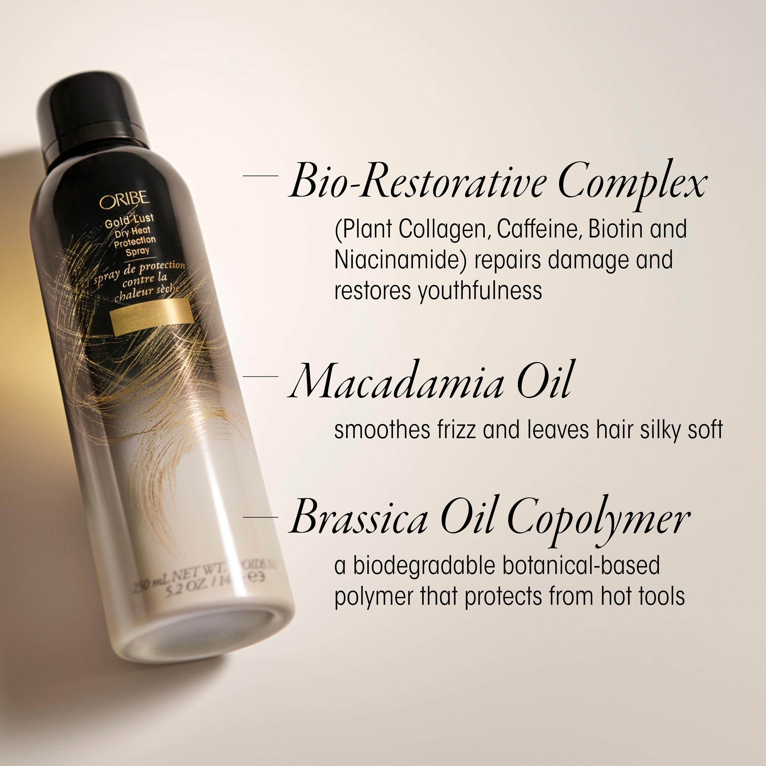 Applying Oribe Gold Lust to dry hair before styling for frizz reduction benefit