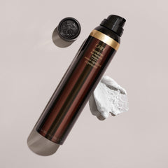 Oribe Grandiose applied during blow-drying to create amplified volume