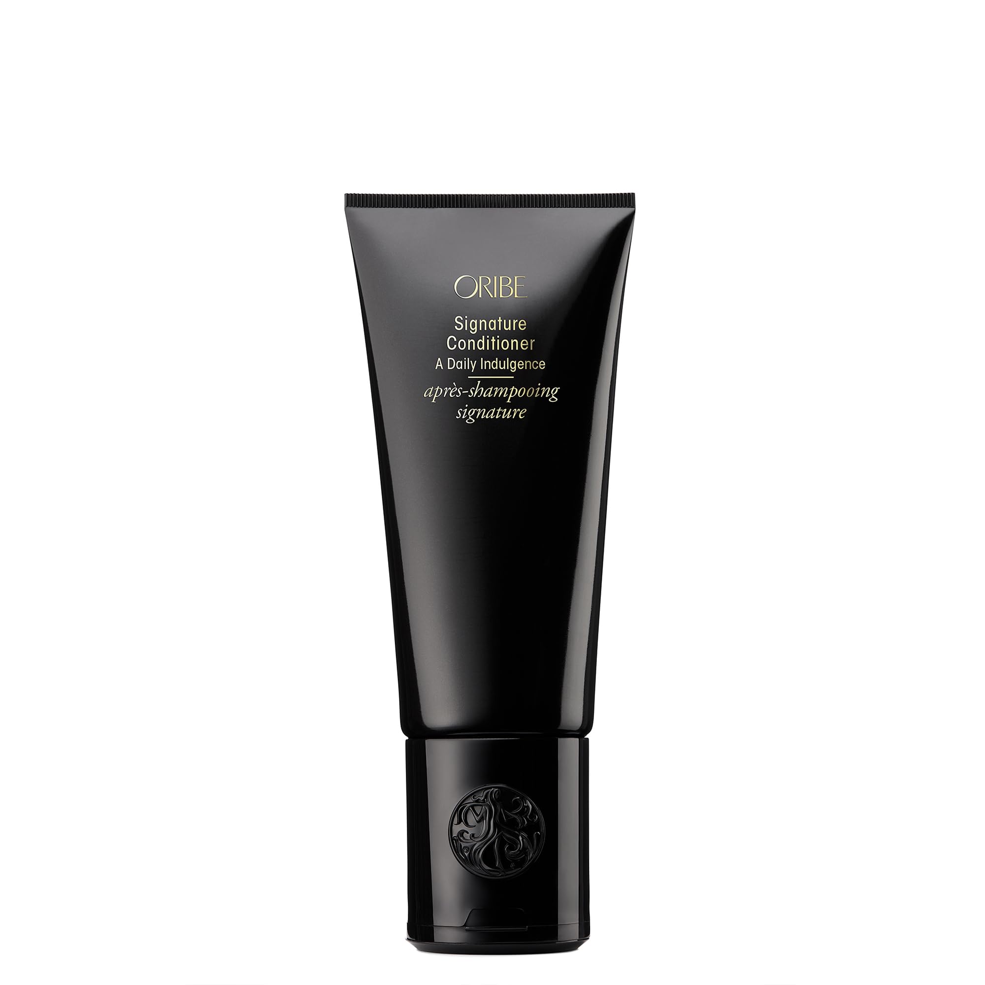 Oribe Signature Conditioner front bottle showing elegant packaging and luxury benefit