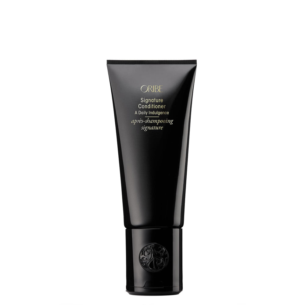 Oribe Signature Conditioner front bottle showing elegant packaging and luxury benefit