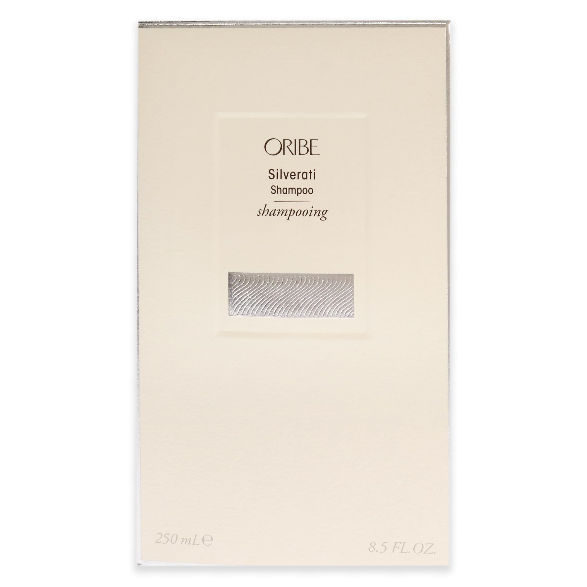 Oribe Silverati bottle next to ruler to show 8.5 oz size and travel practicality