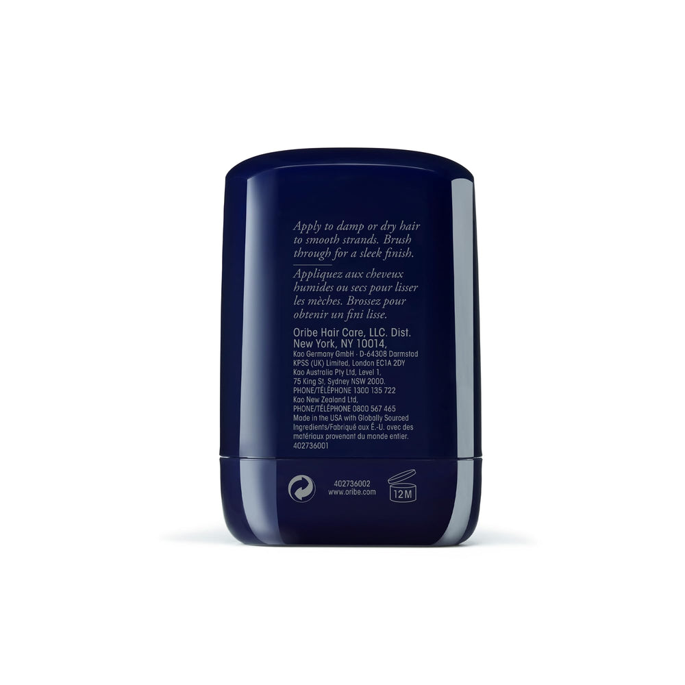 Oribe wax stick with cap off and twist-up showing easy application benefit