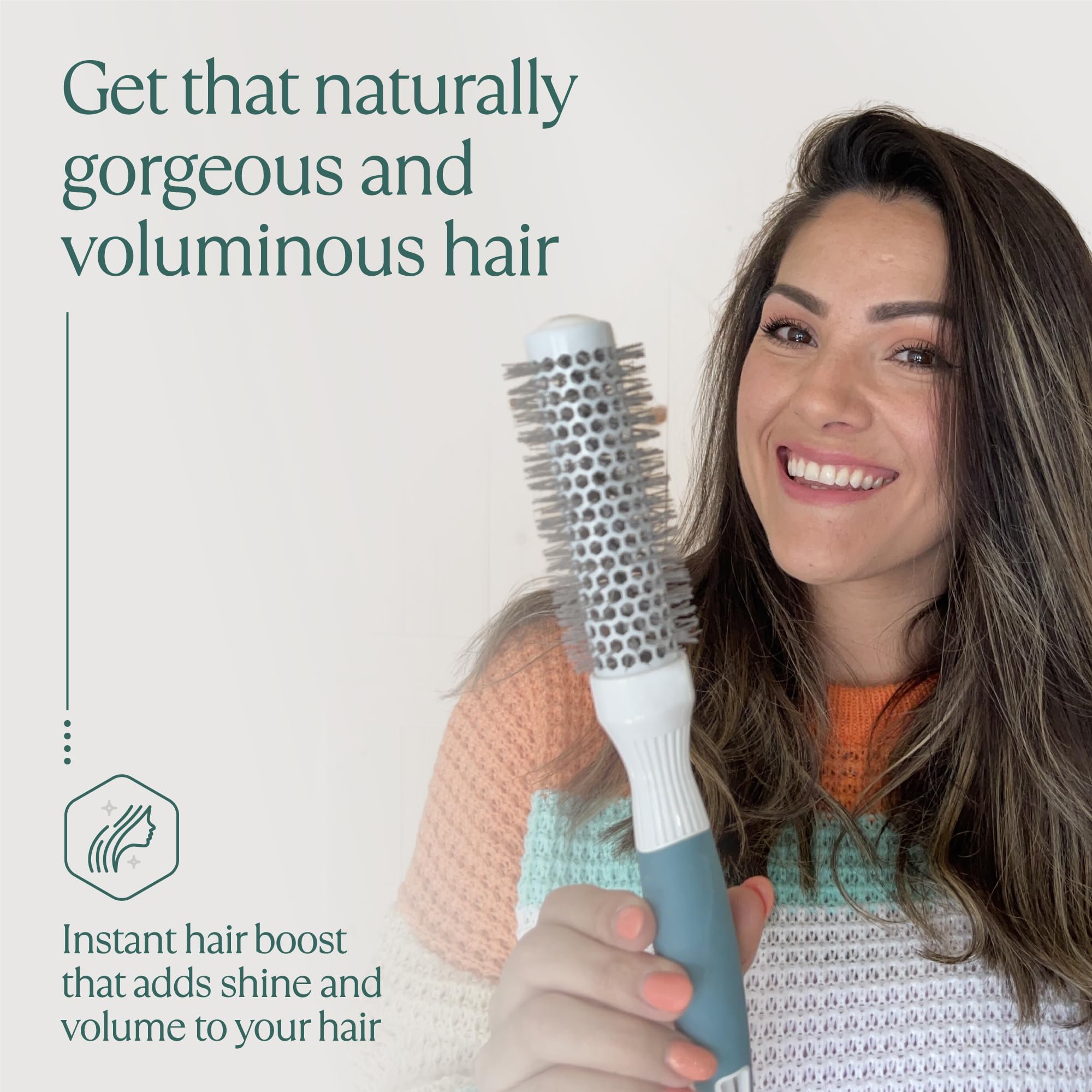 Osensia brush on bathroom counter staged beside dryer highlighting everyday styling convenience
