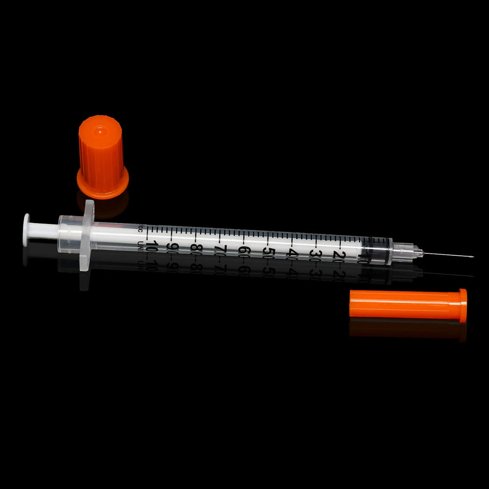 otwooi shown in hand for scale to confirm 1/2 inch needle length and compact size