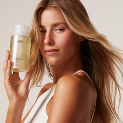 OUAI rich shampoo lather texture demonstrating gentle cleansing and lightweight foam