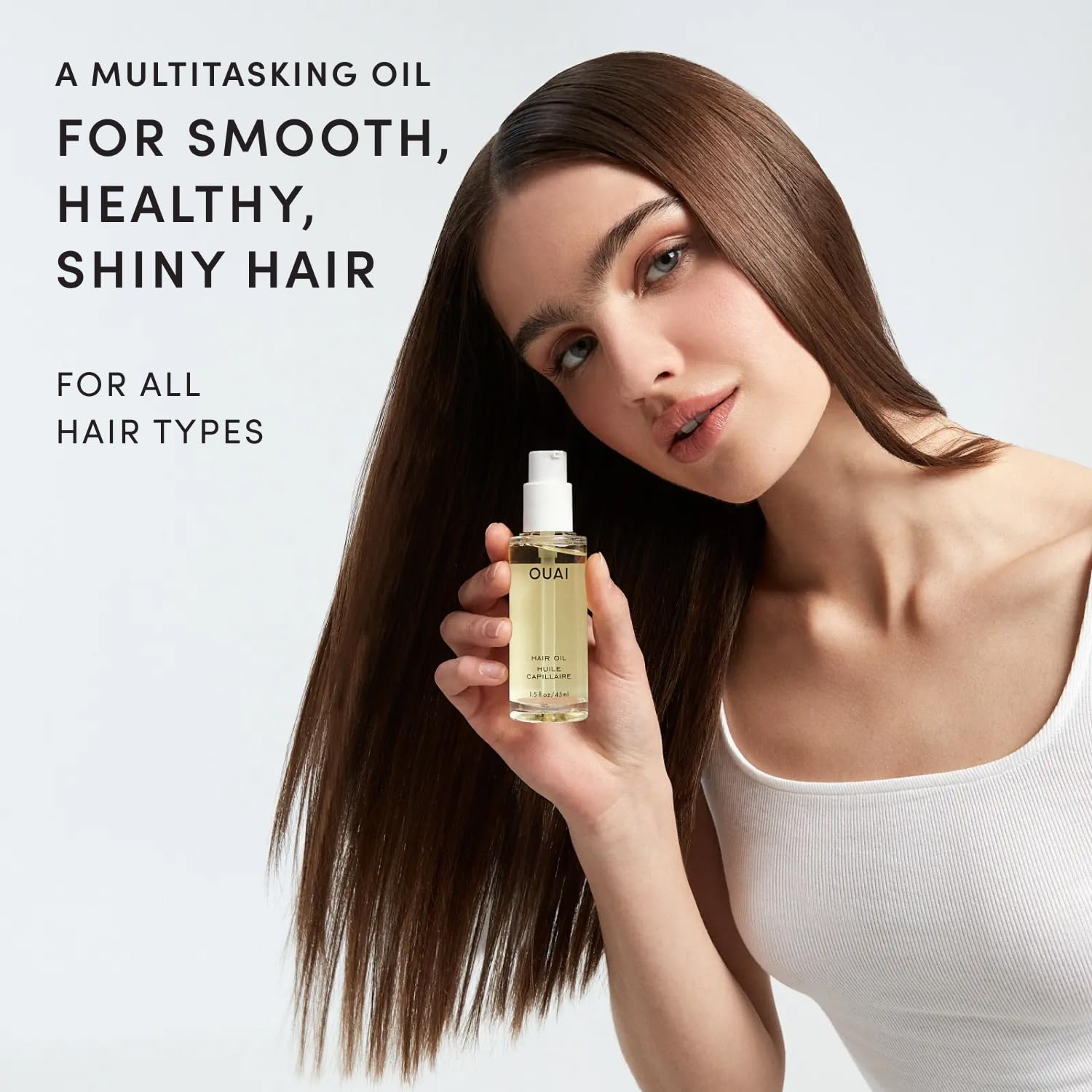 OUAI dropper with oil texture demonstrating lightweight absorbency