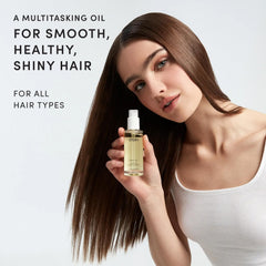OUAI dropper with oil texture demonstrating lightweight absorbency