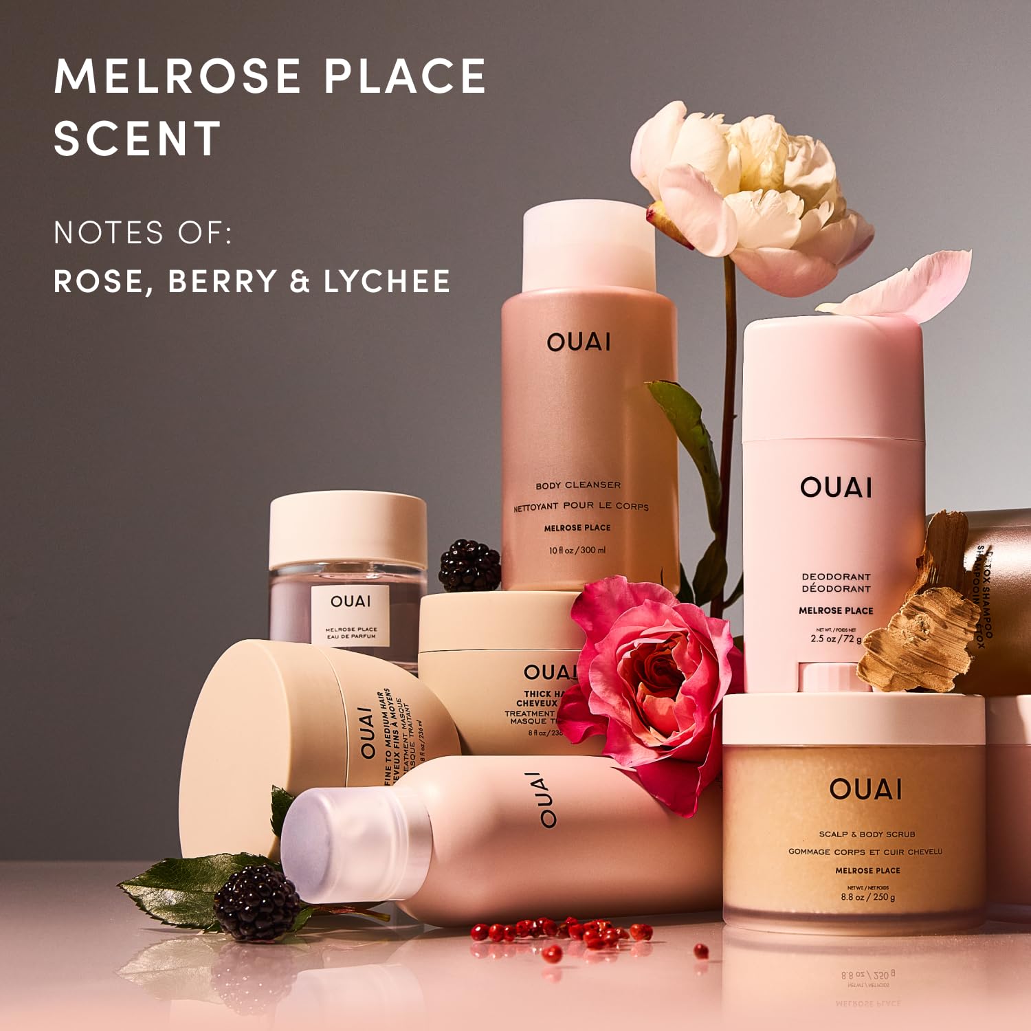 OUAI bottle beside everyday items to show product scale and travel-friendly benefit