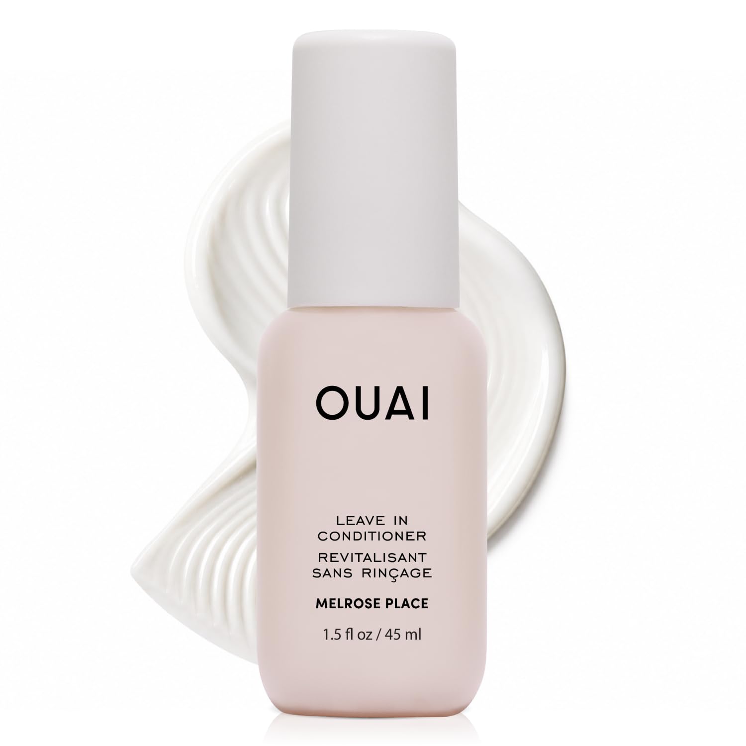 OUAI travel-size bottle front packaging shows compact convenience