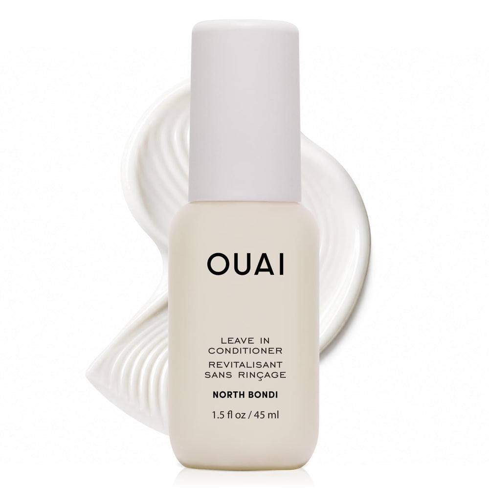 OUAI travel bottle front view showing compact design and label benefits