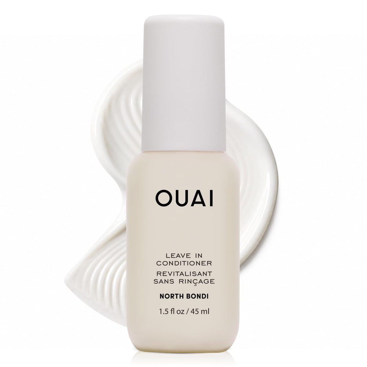 OUAI travel bottle front view showing compact design and label benefits