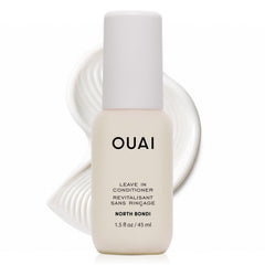 OUAI travel bottle front view showing compact design and label benefits