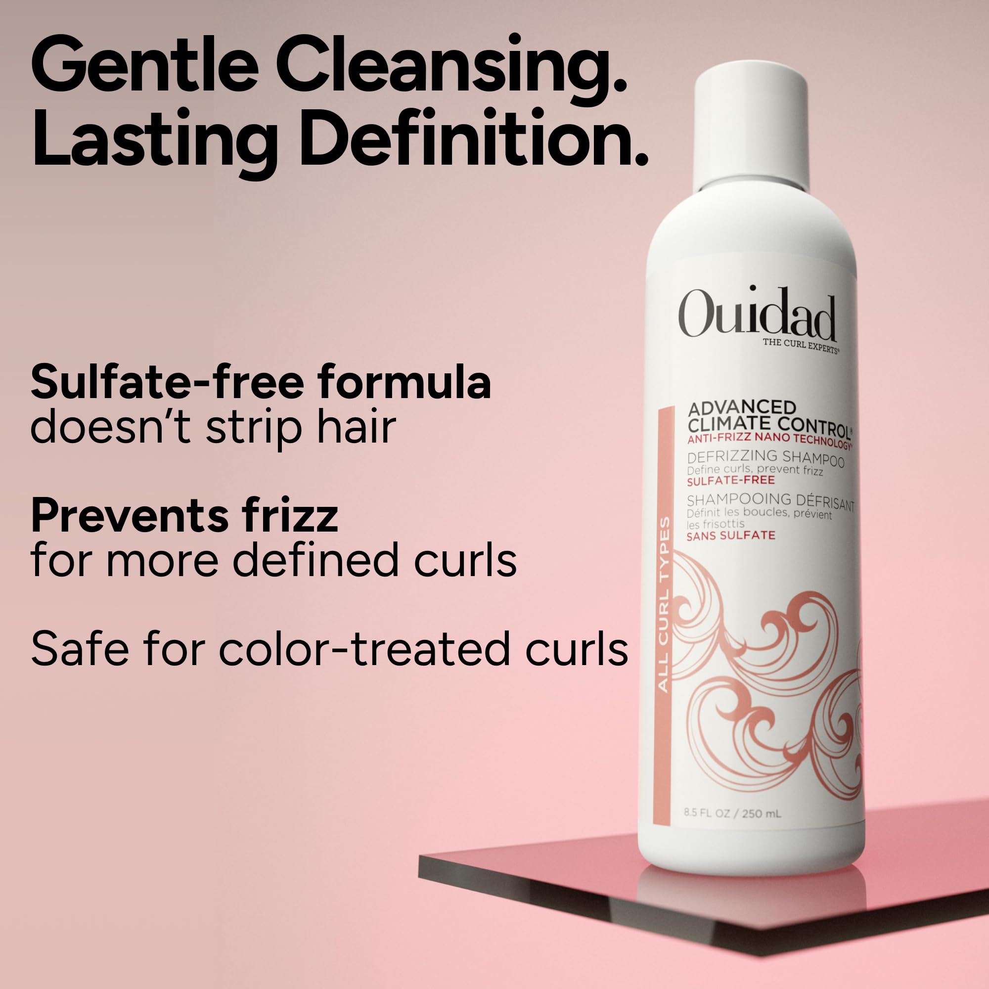 Ouidad bottle being poured to reveal floral scent and smoothness benefit