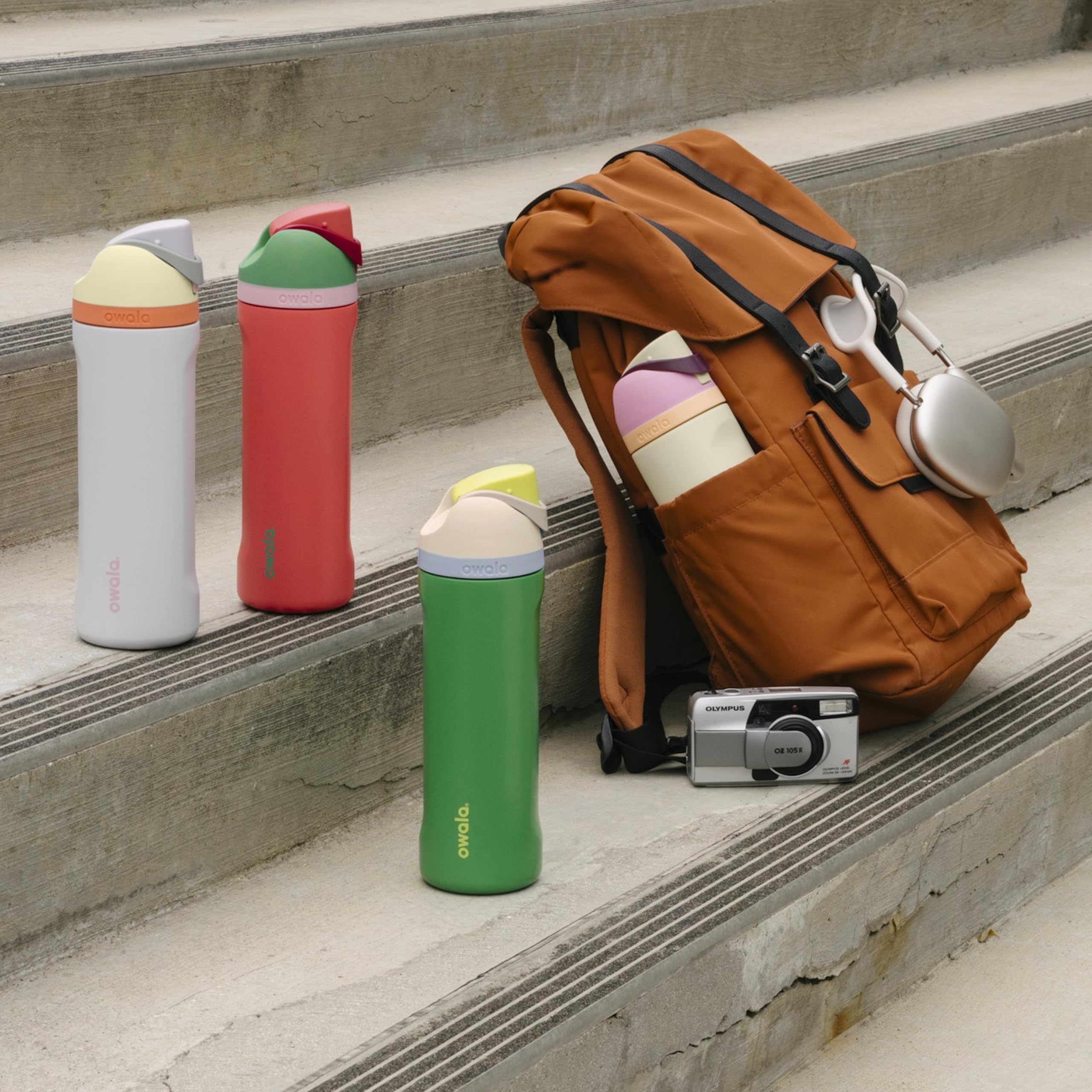 Owala FreeSip lid detail with push-button lock for hygienic protection