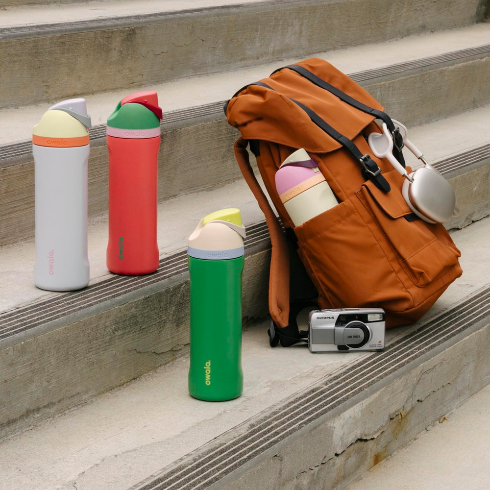 Owala FreeSip lid detail with push-button lock for hygienic protection