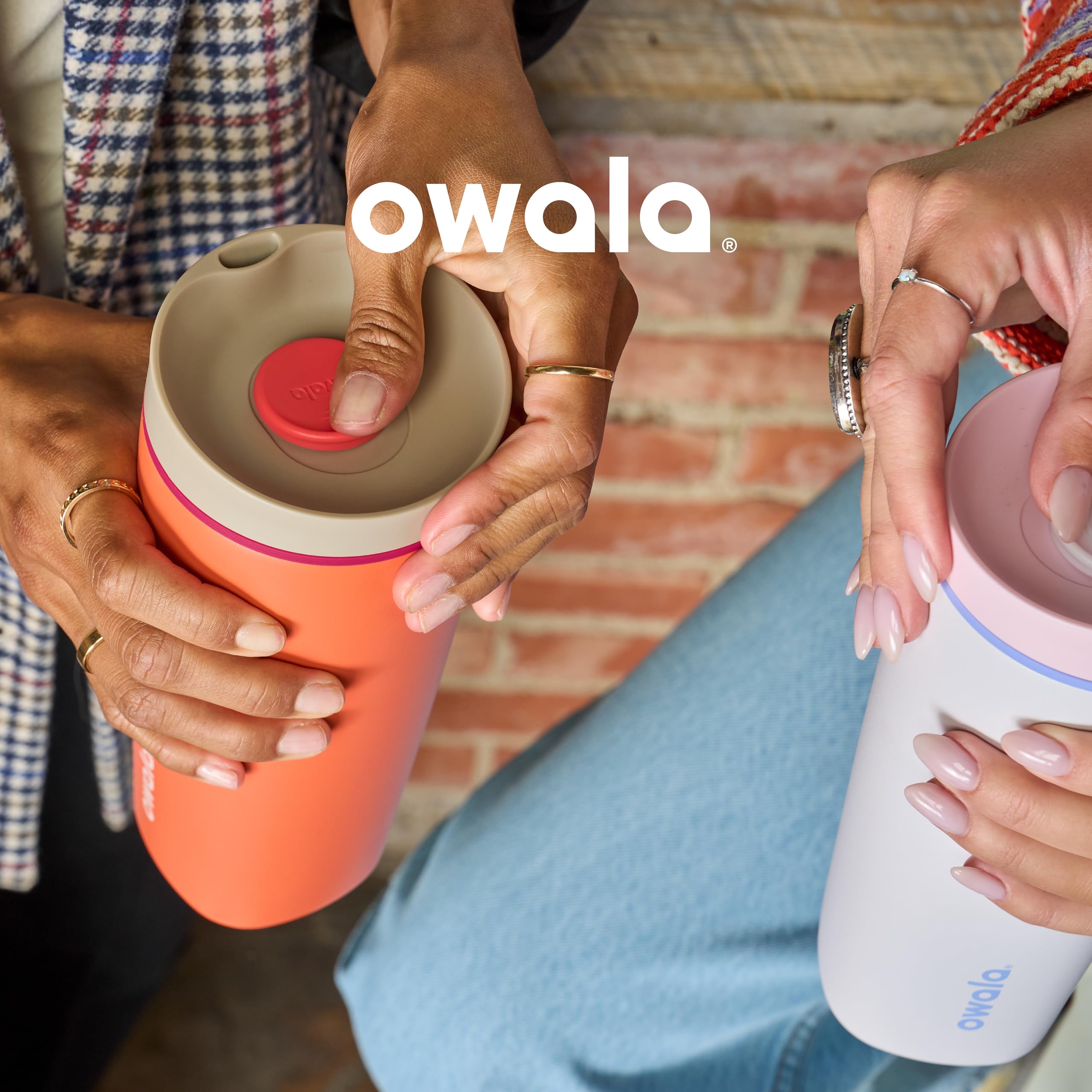 Owala SmoothSip Slider on a car cup holder depicting travel-ready leakproof convenience
