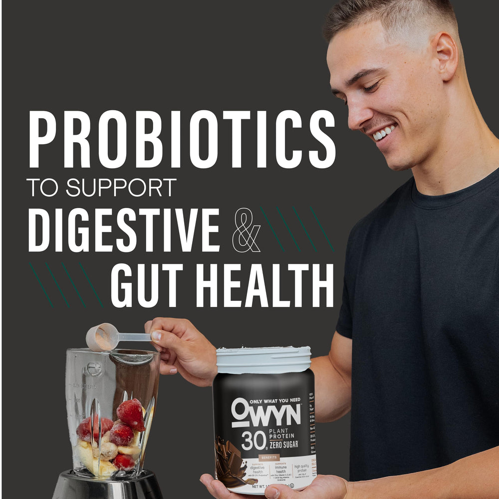 OWYN Pro Elite scoop of powder beside tub showing serving size for convenience