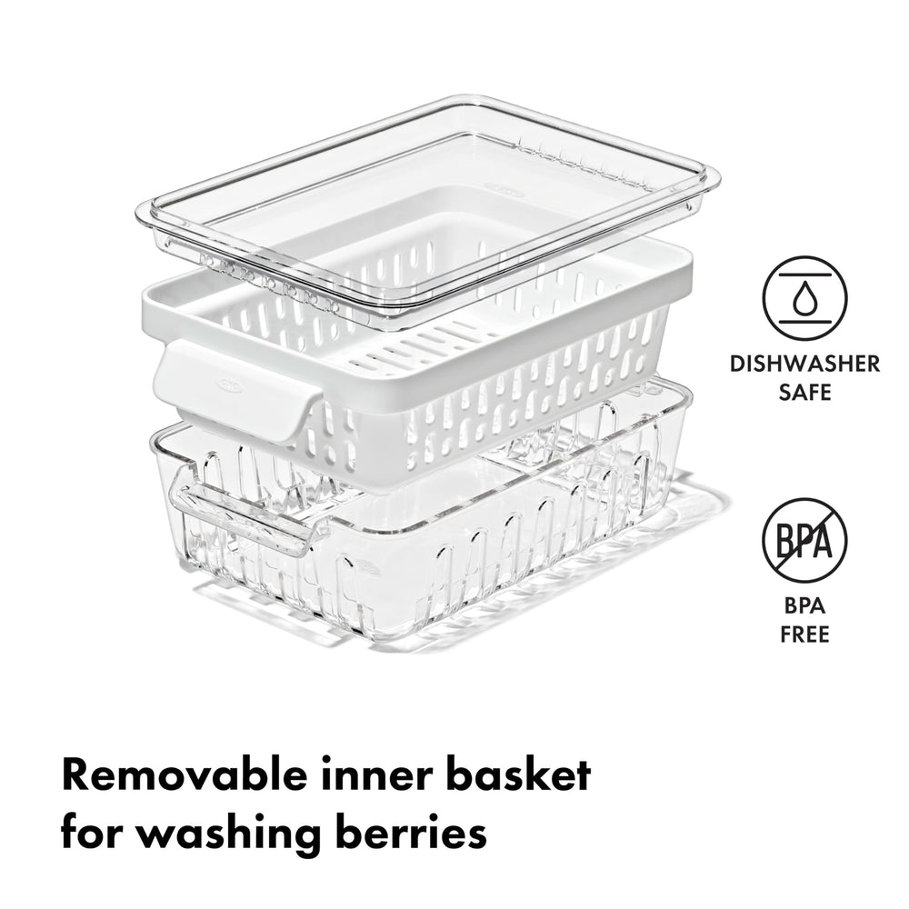 OXO Berry Keeper scale with hand showing compact size for fridge fit