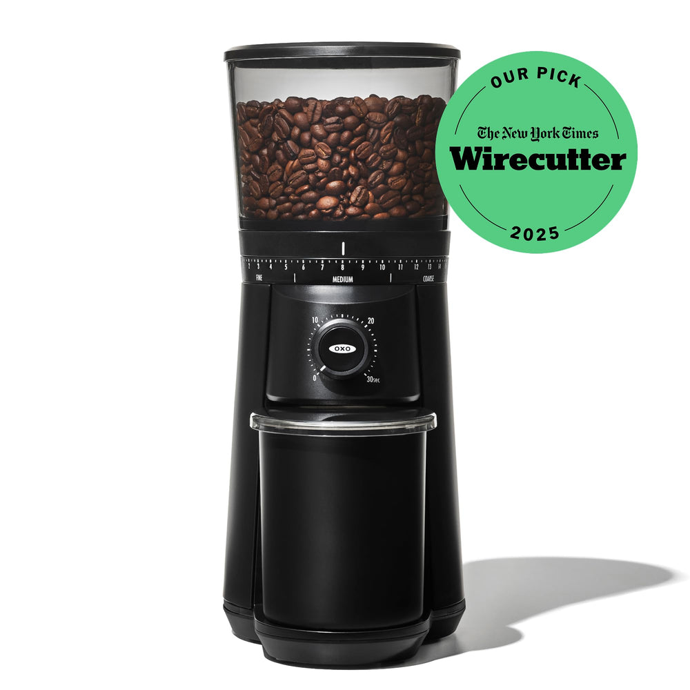 OXO Brew producing grounds into portafilter demonstrating repeatable dosing benefit