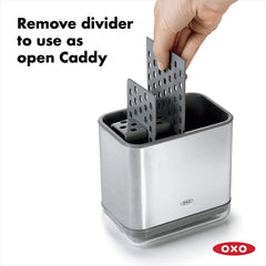 OXO caddy holding sponges and brushes keeps cleaning tools handy and tidy