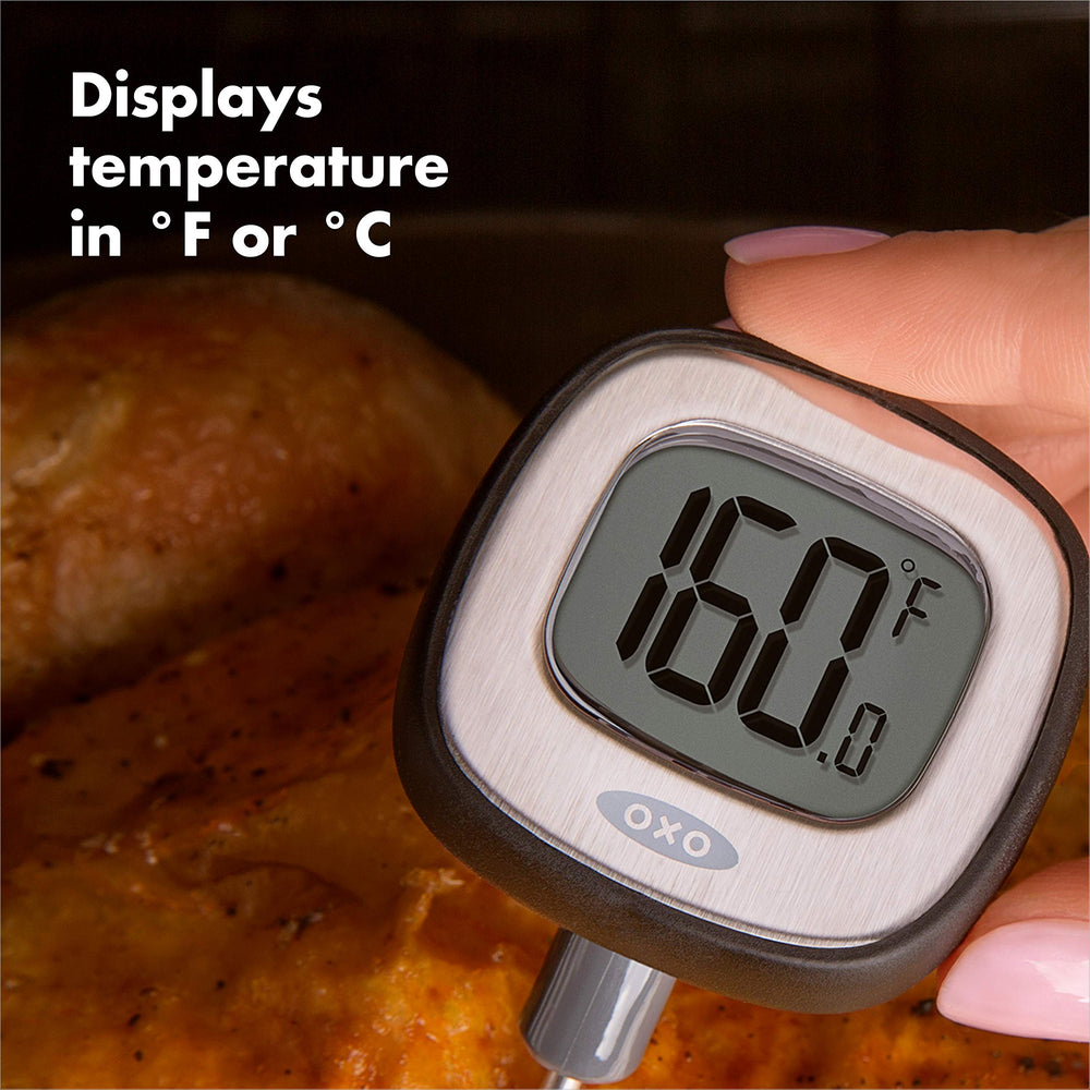 OXO Good Grips probe sleeve with printed USDA and chef temperature chart for quick guidance