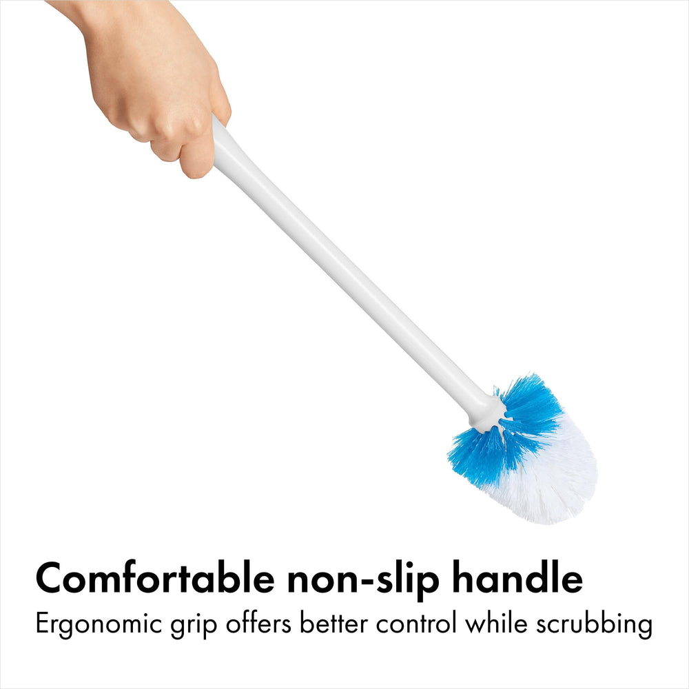 OXO brush in use cleaning bowl for targeted stain removal